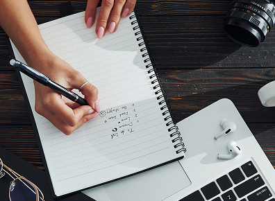 Person writing notes